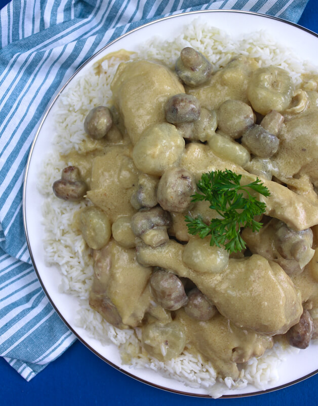 Old-fashioned Chicken Fricassee with Wine-flavored Cream Sauce, Onions, and Mushrooms Julia Child Recipe