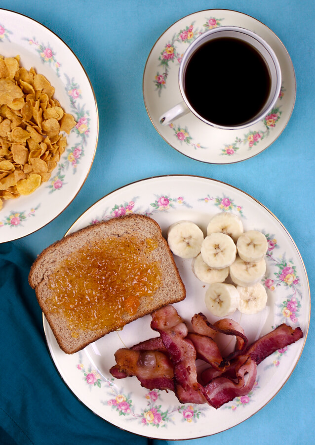 1940s Breakfast with Bacon, Cereal, Toast, and Coffee